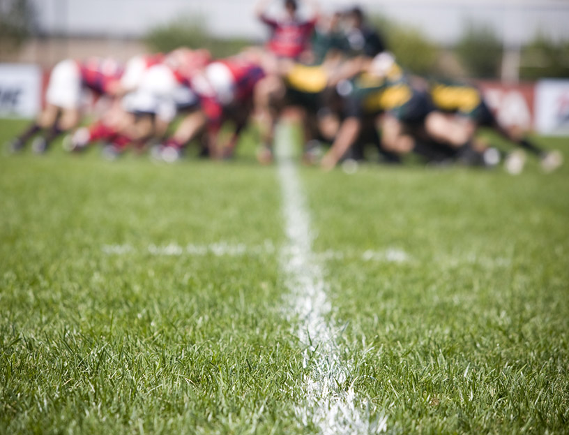 A rugby team in a huddle