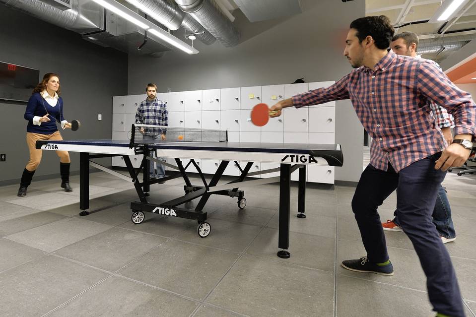 Humana employees playing ping pong